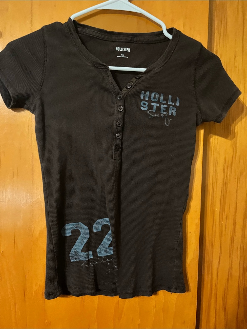 Hollister Black Short-Sleeve Henley Tee with Blue Graphics